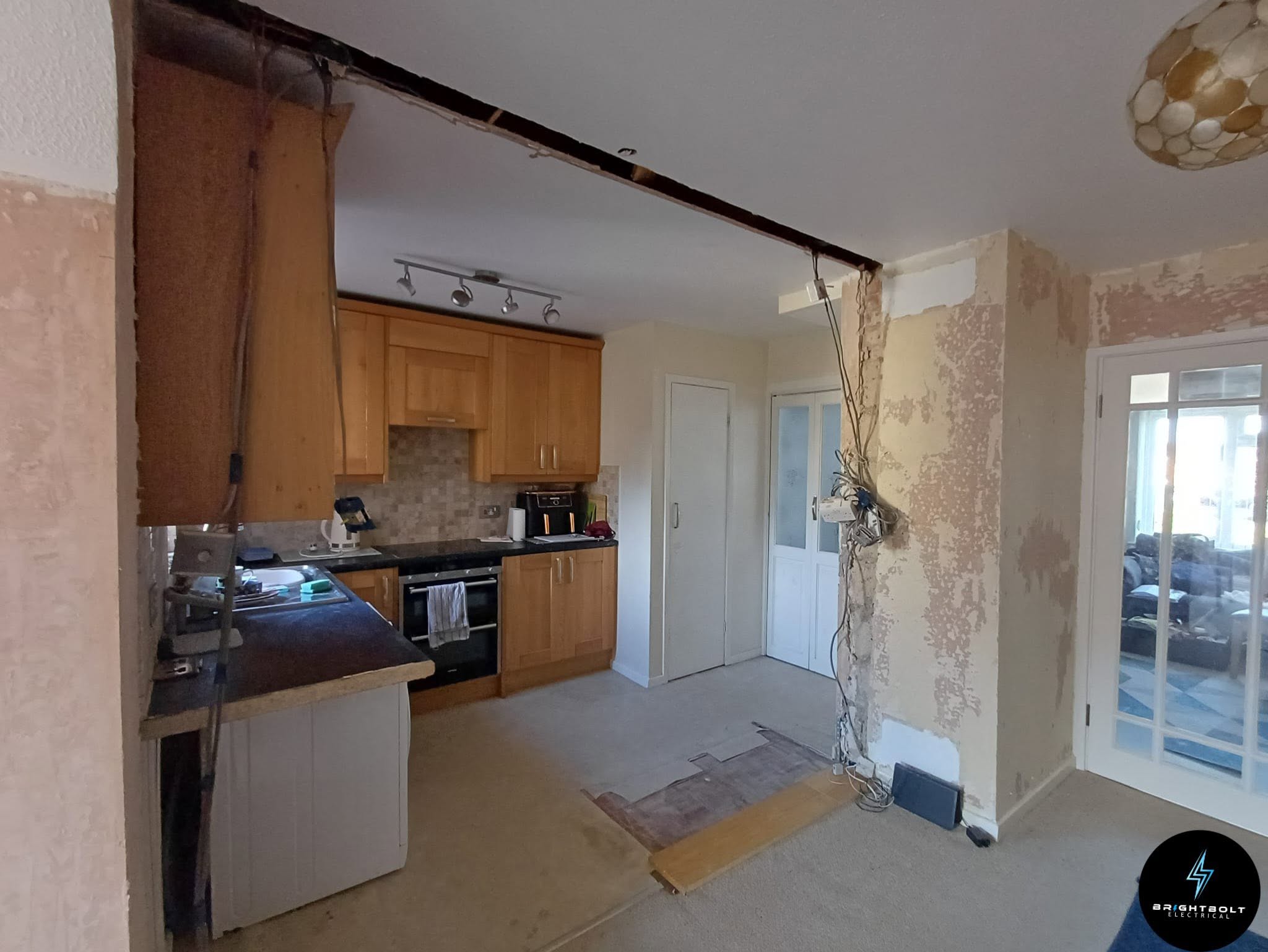 Kitchen opened up with cables left accessible during the work