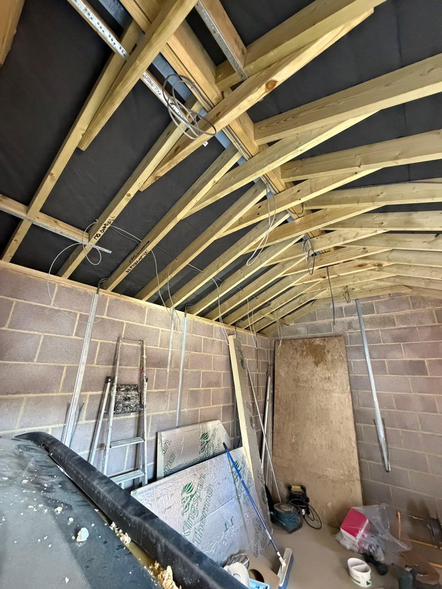 First fix cables in an outbuilding roof